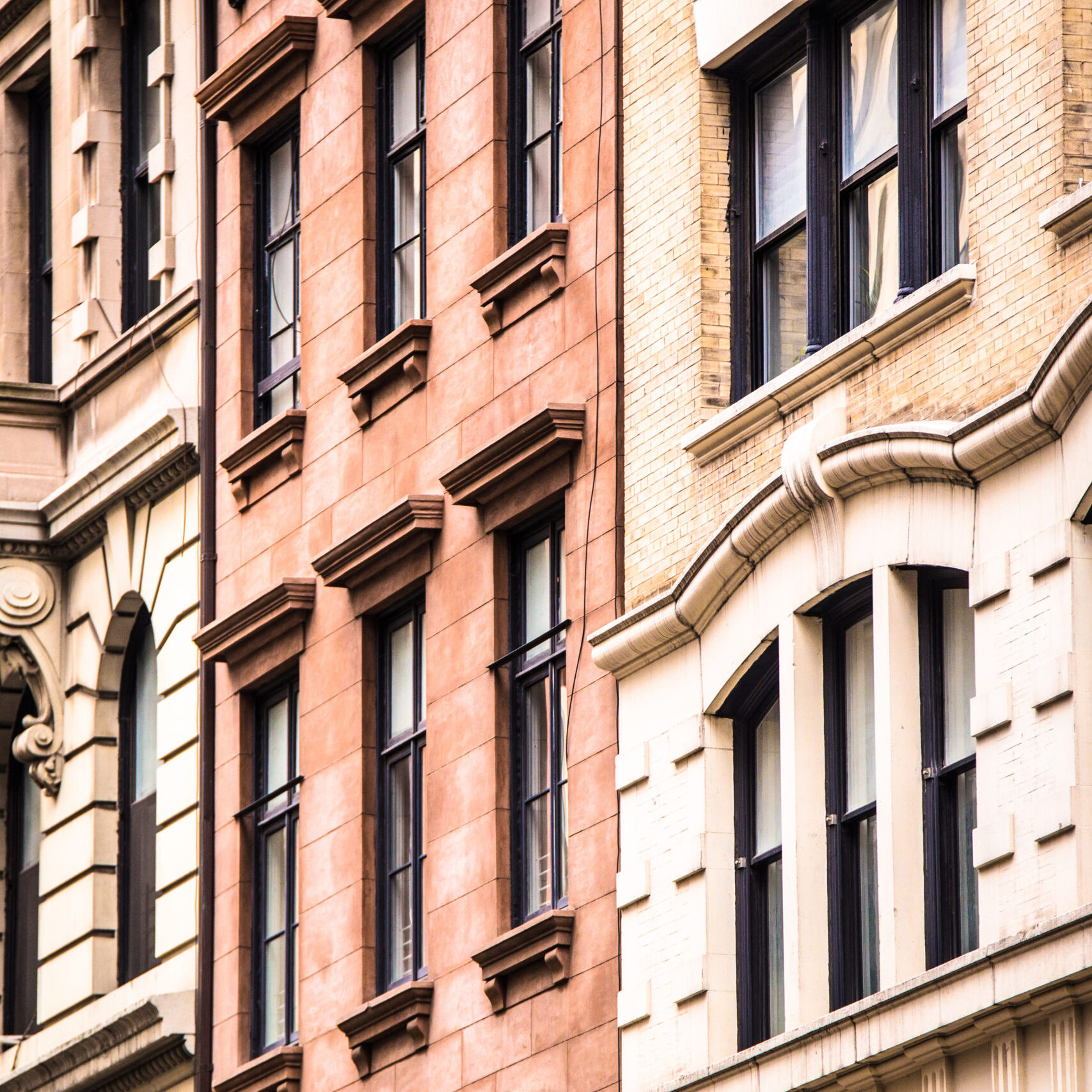 Architectural details on vintage brick apartment building in New York City